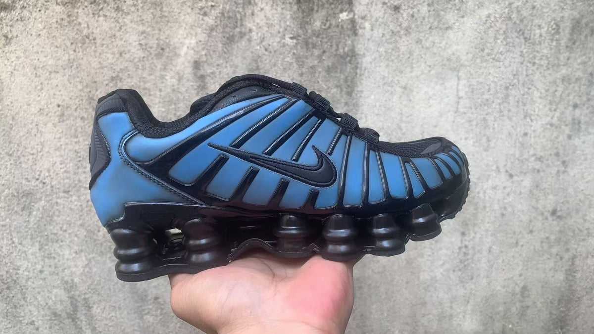 Nike Shox TL Trainers in Mixed Colorways - product image from the listing.