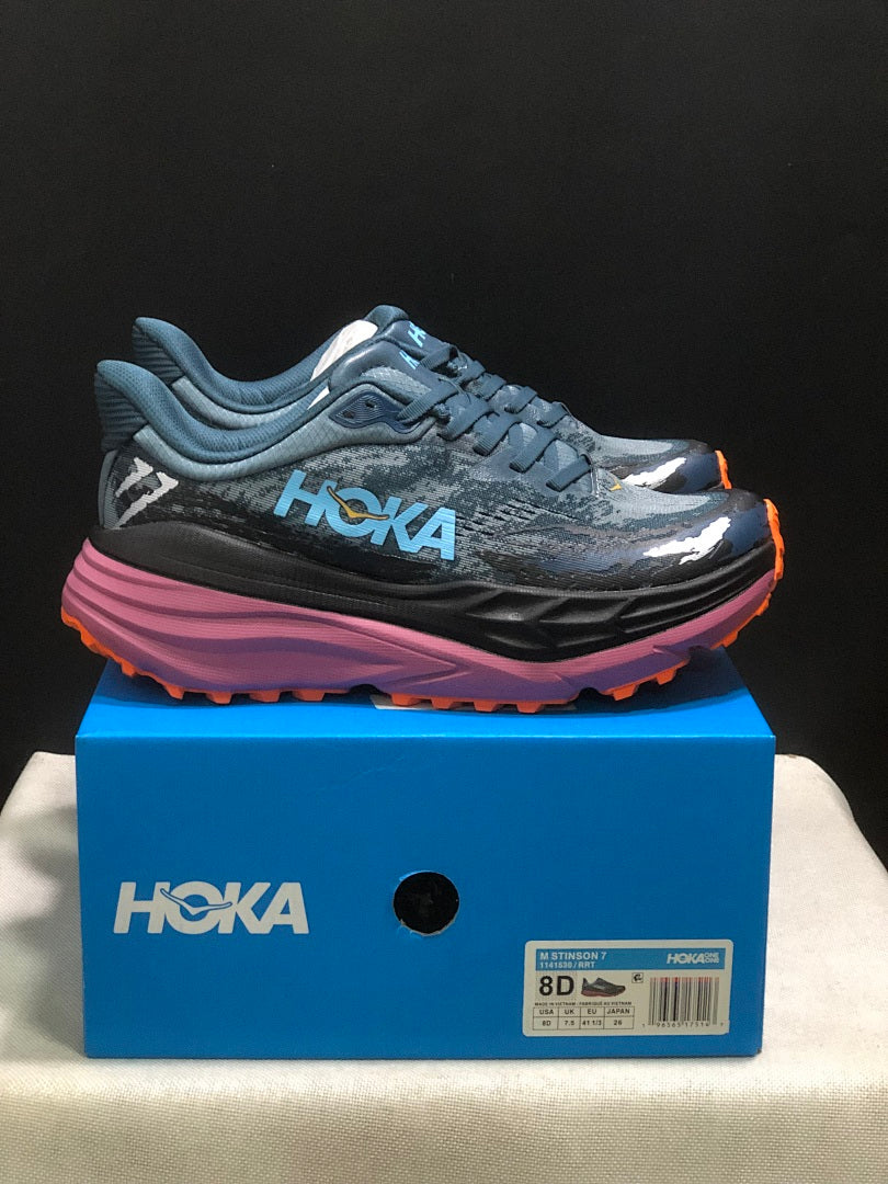 Blue and Orange HOKA Stinson 7 Trail Running Shoes - product image from the listing.
