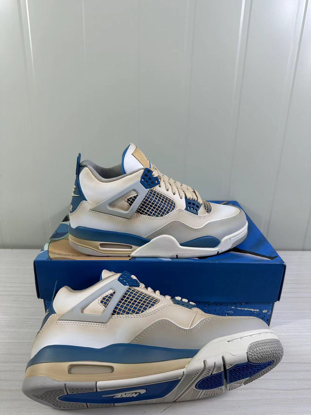 Air Jordan 4 Retro White Blue 308497-105 - product image from the listing.