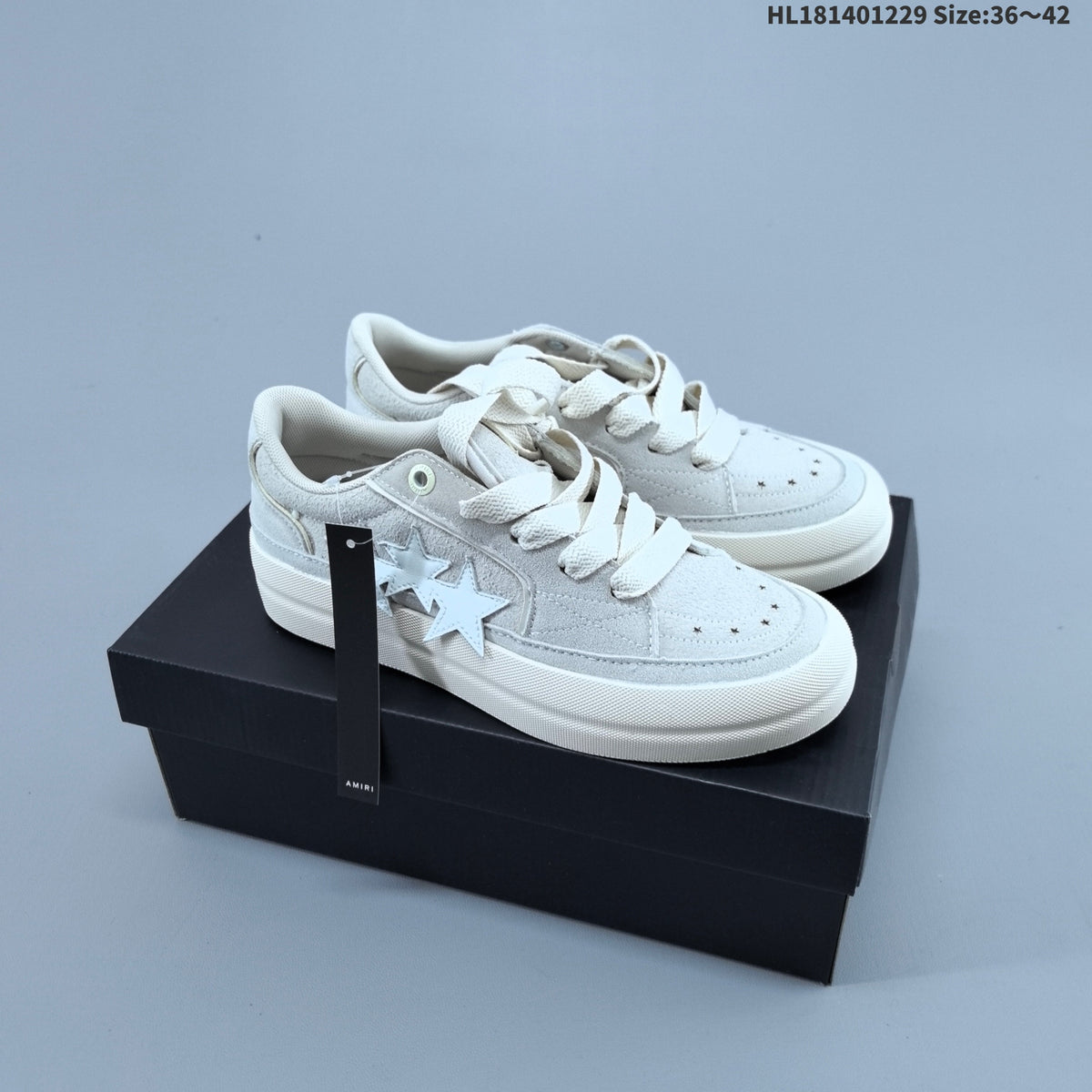 AMIRI Star Low-Cut Sneakers with Leopard Print Details - product image from the listing.