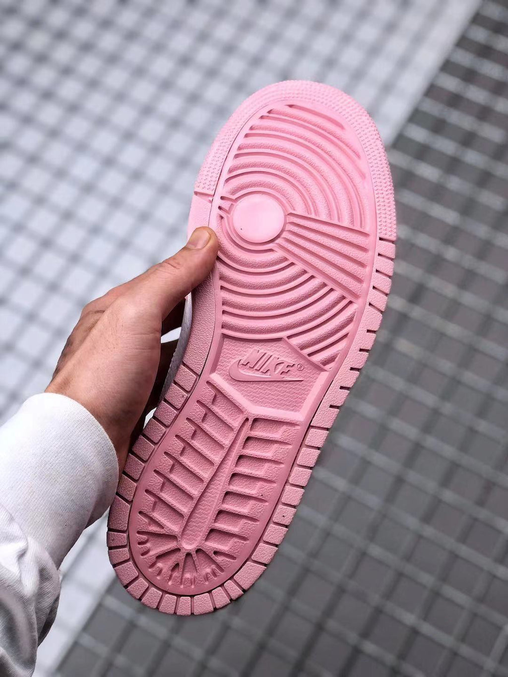 Jordan 1 High Zoom CMFT Sneakers in Pink White Orange CT0979-601 - product image from the listing.