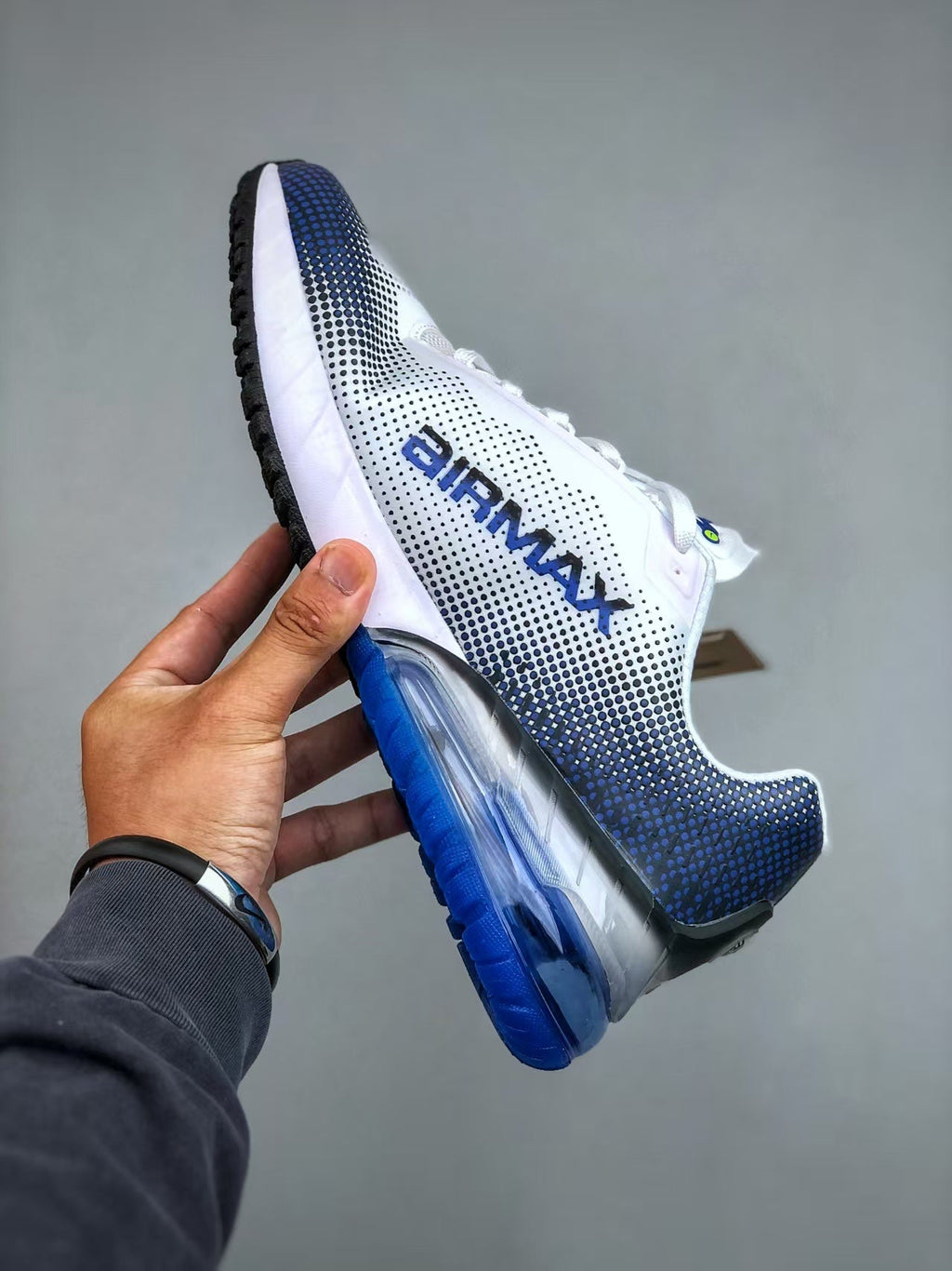 Nike Air Max White and Blue Running-Style Trainers - product image from the listing.