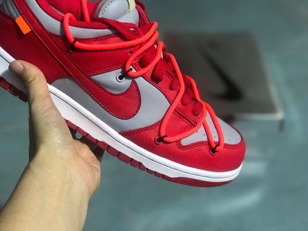 Nike Dunk Low LTHR / OW Sneakers in Red Gray CT0856-600 - product image from the listing.
