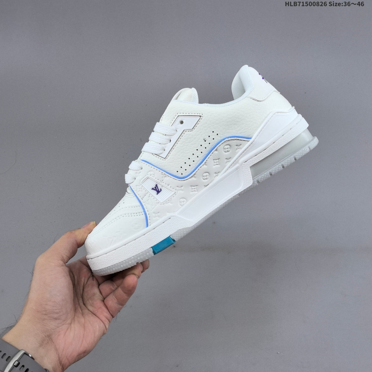 Louis Vuitton White Low-Cut Sneakers with Blue Accents - product image from the listing.