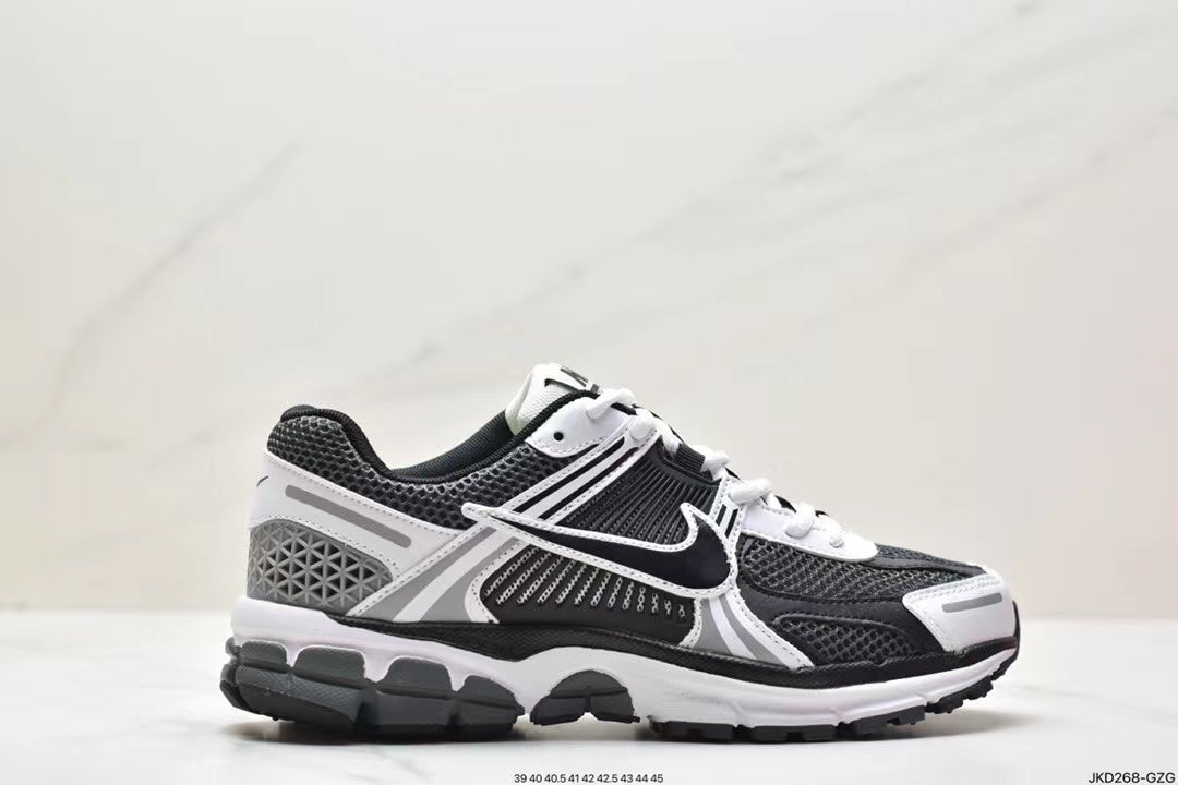 Nike Air More Uptempo Sneakers in Black and White - product image from the listing.