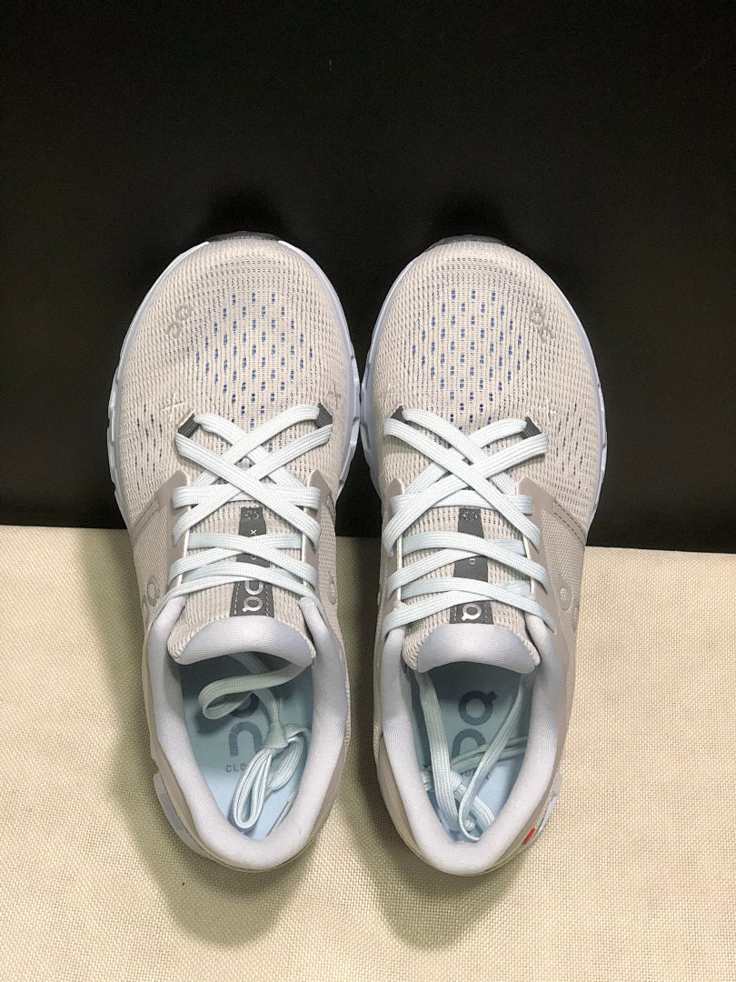 Silver and Blue On Cloud X 4 Sneakers - product image from the listing.