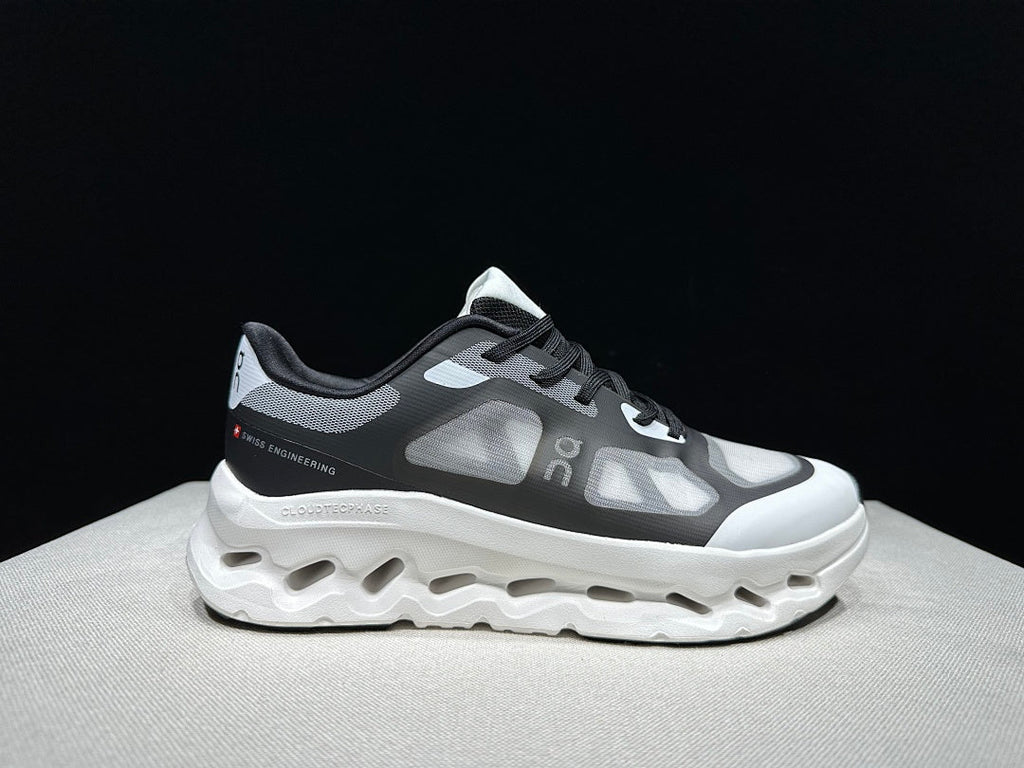 On Cloudtilt Remix Sneakers in White Black - product image from the listing.