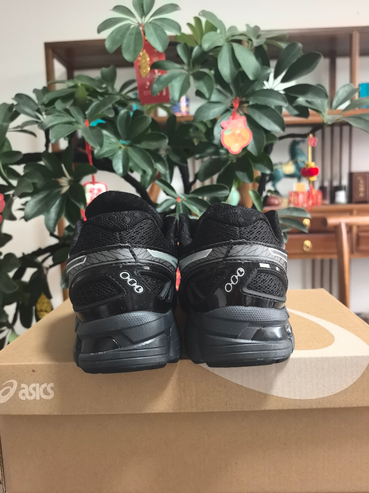 ASICS N1 Running Sneakers in Black - product image from the listing.
