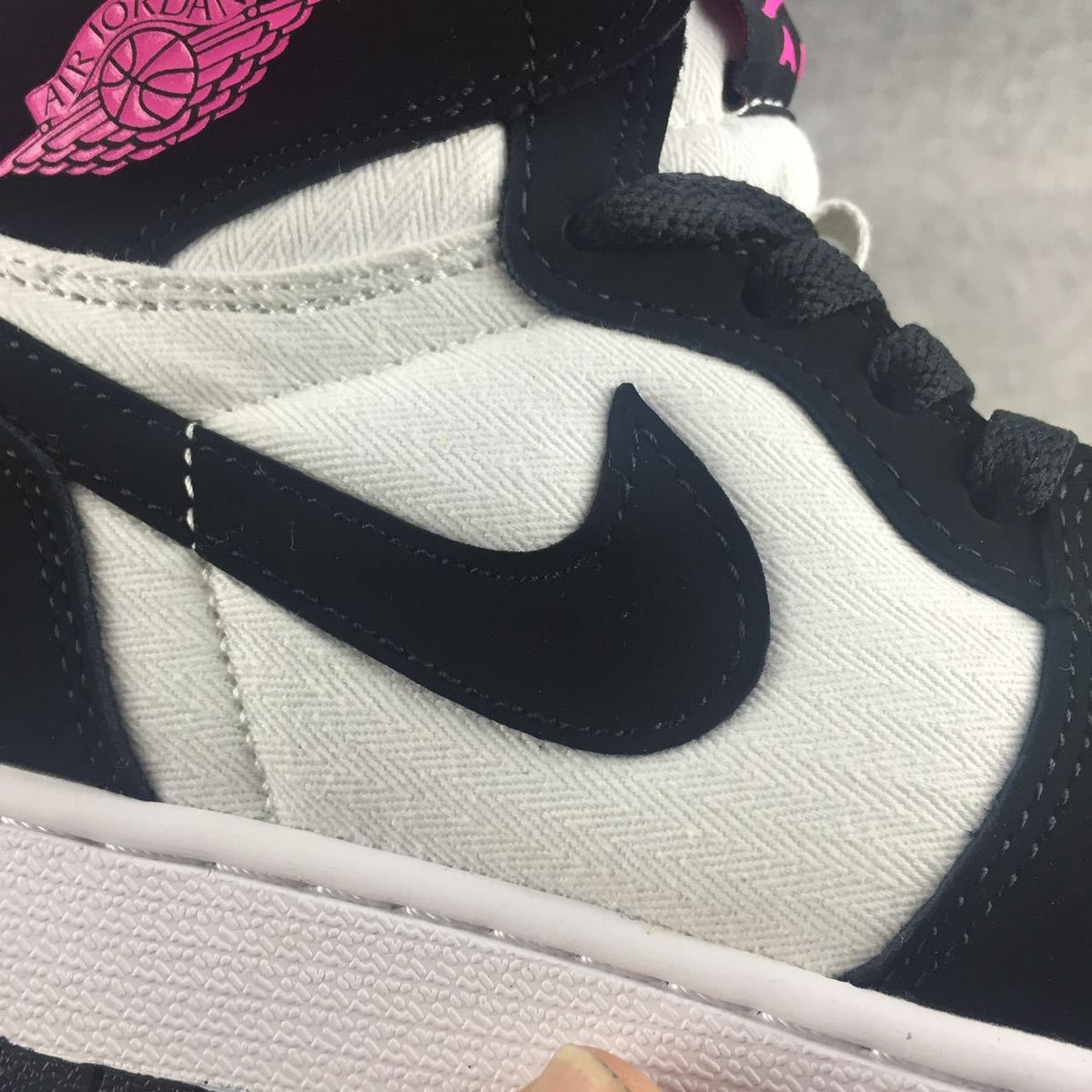 Air Jordan 1 High Black White Pink Sneakers - product image from the listing.