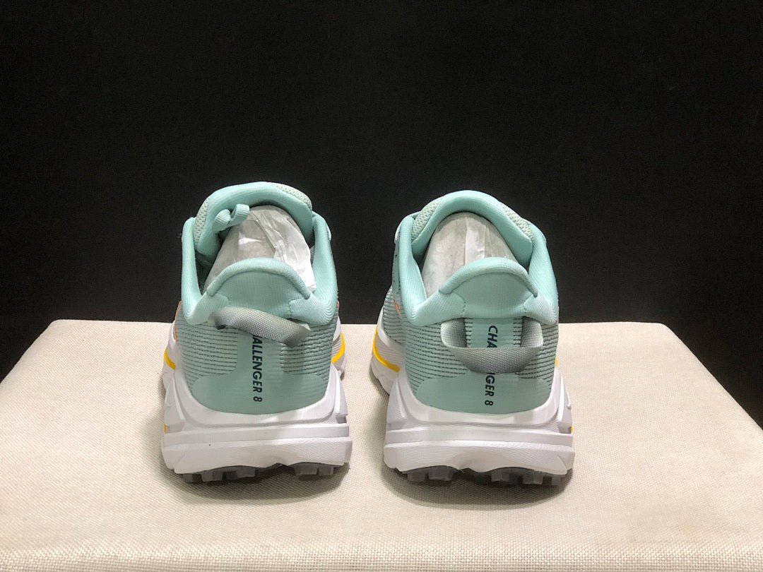 HOKA Challenger 8 Trail Running Shoes, Sage and in Coral - product image from the listing.