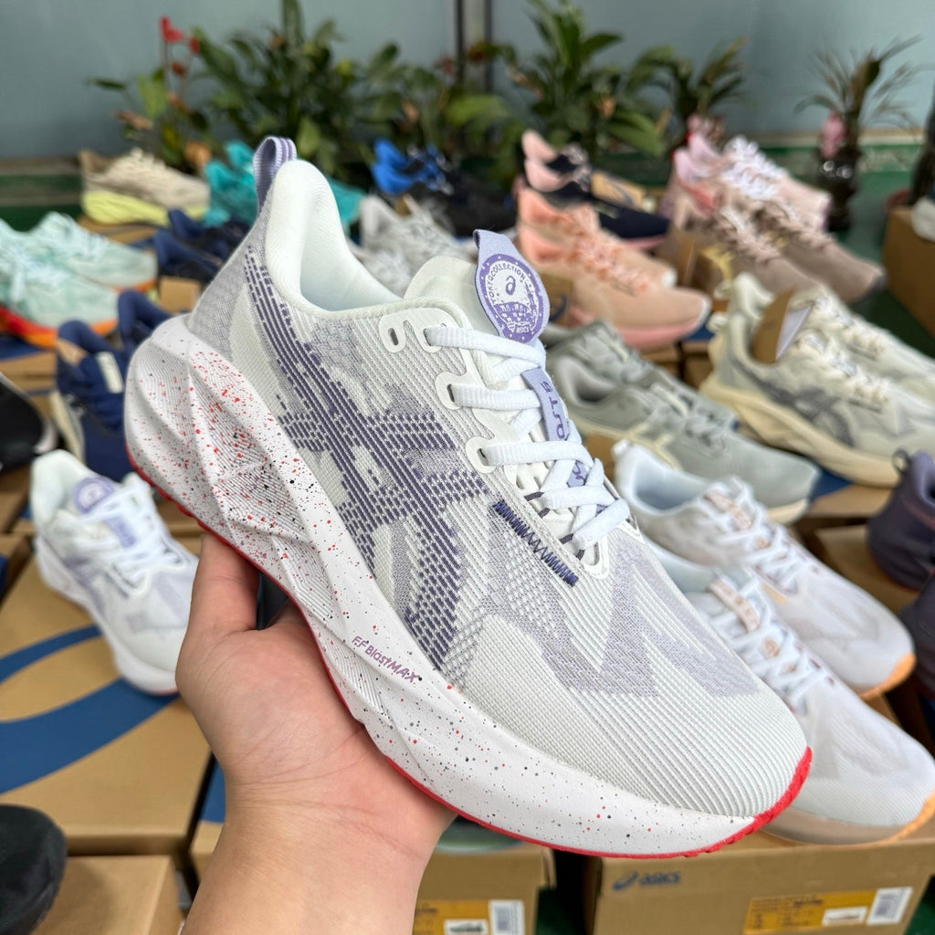 ASICS NOVABLAST 5 LE Running Shoes in White Purple - product image from the listing.