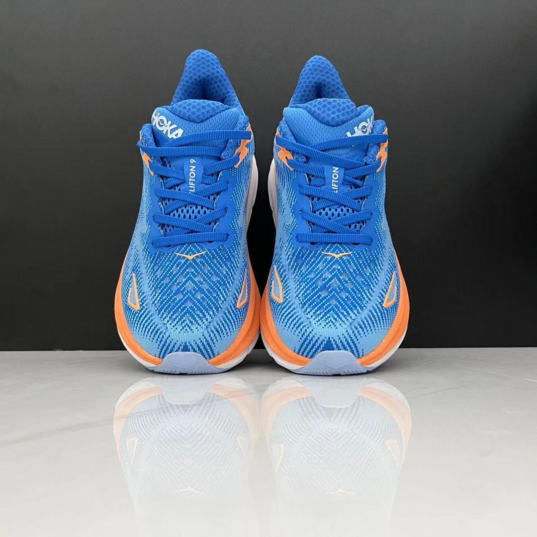 Blue and Orange HOKA Clifton 9 Running Shoes - product image from the listing.