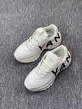 White Chunky Lace-Up Trainers with Black Lettering - product image from the listing.