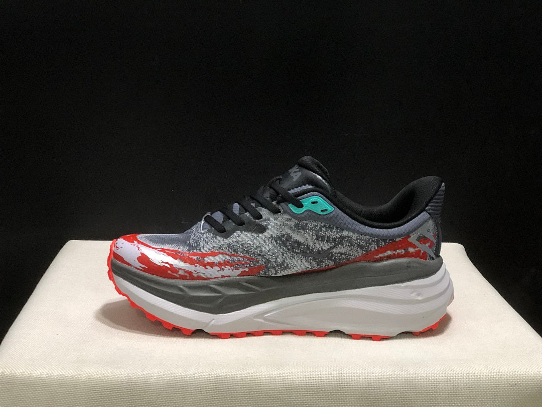 HOKA Stinson 7 Trail Running Shoes in Gray Red - product image from the listing.
