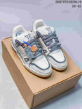 Louis Vuitton Trainer Maxi Low-Top Sneakers in White Gray - product image from the listing.