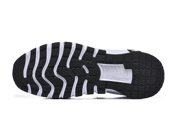 Nike Free Low-Top Sneakers in Red - product image from the listing.