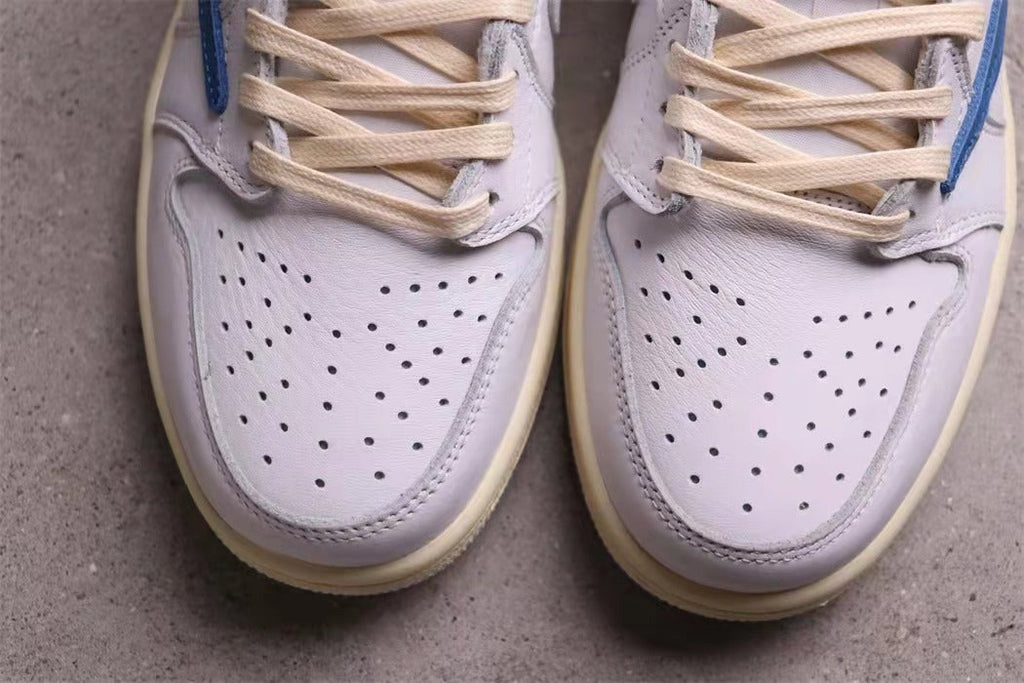 Jordan Travis Scott Air Jordan 1 Low in White Blue DM3277-100 - product image from the listing.