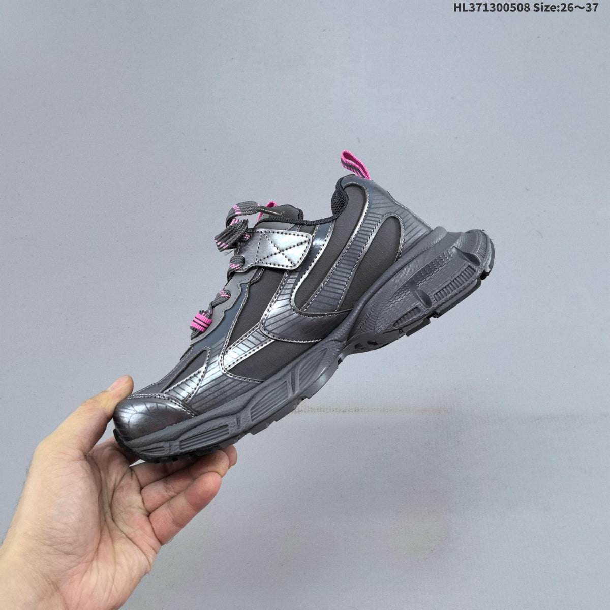 Balenciaga Kids Chunky Lace-Up Sneakers, in Silver and Charcoal - product image from the listing.