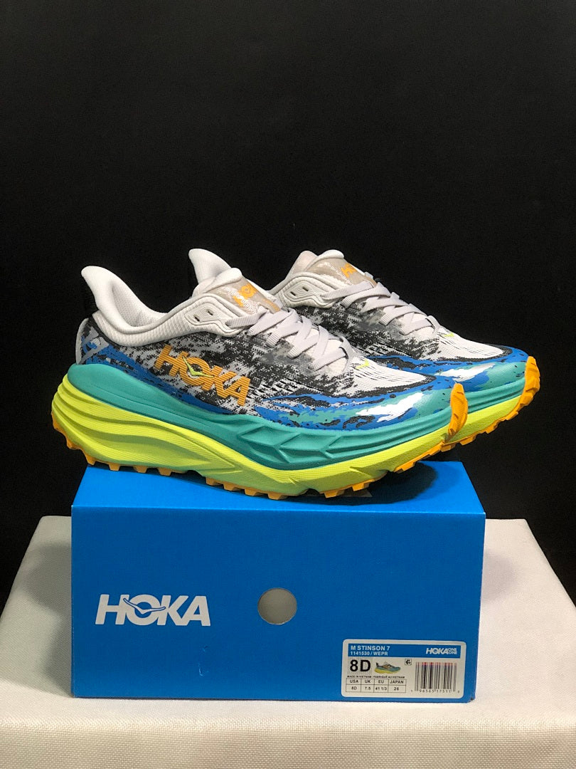 Blue and Lime HOKA Stinson 7 Trail Sneakers - product image from the listing.