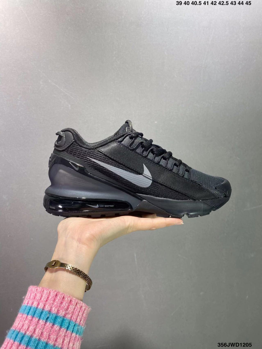 Black and Gray Nike Air Max Pulse Sneakers - product image from the listing.