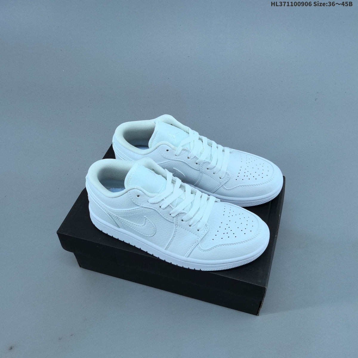 Sneakers, White and Color-Accent Styles - Nike Air Jordan 1 Low - product image from the listing.