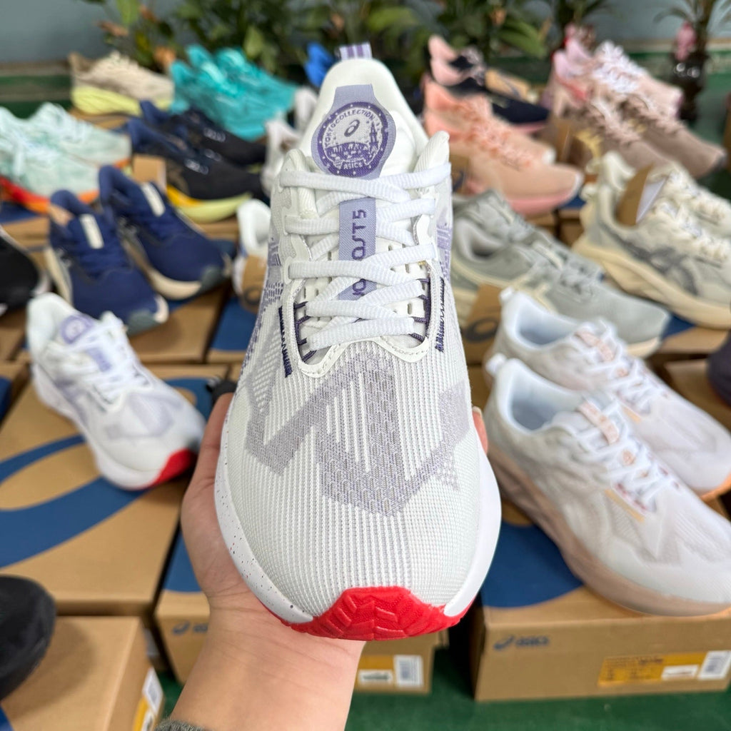 ASICS NOVABLAST 5 LE Running Shoes in White Purple - product image from the listing.