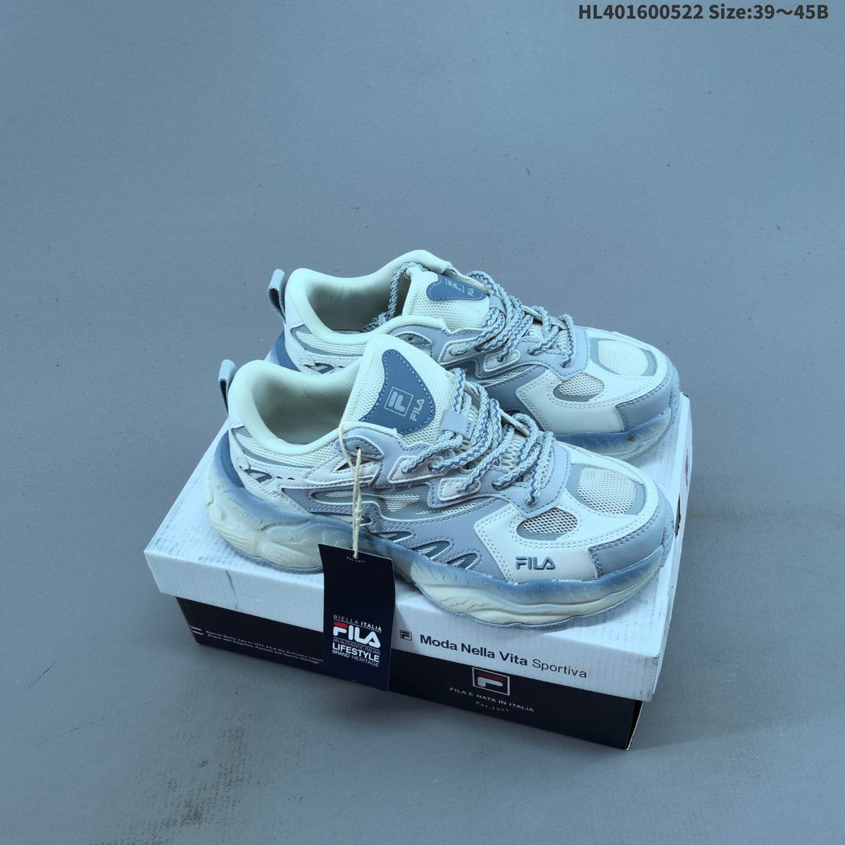 FILA FERN Low-Top Sneakers in White and Blue F12M622118FSP - product image from the listing.