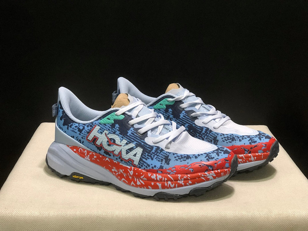 HOKA Speedgoat 6 Trail Running Shoes, in Blue and Orange - product image from the listing.