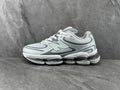 New Balance 1906R Sneakers in White and Silver - product image from the listing.
