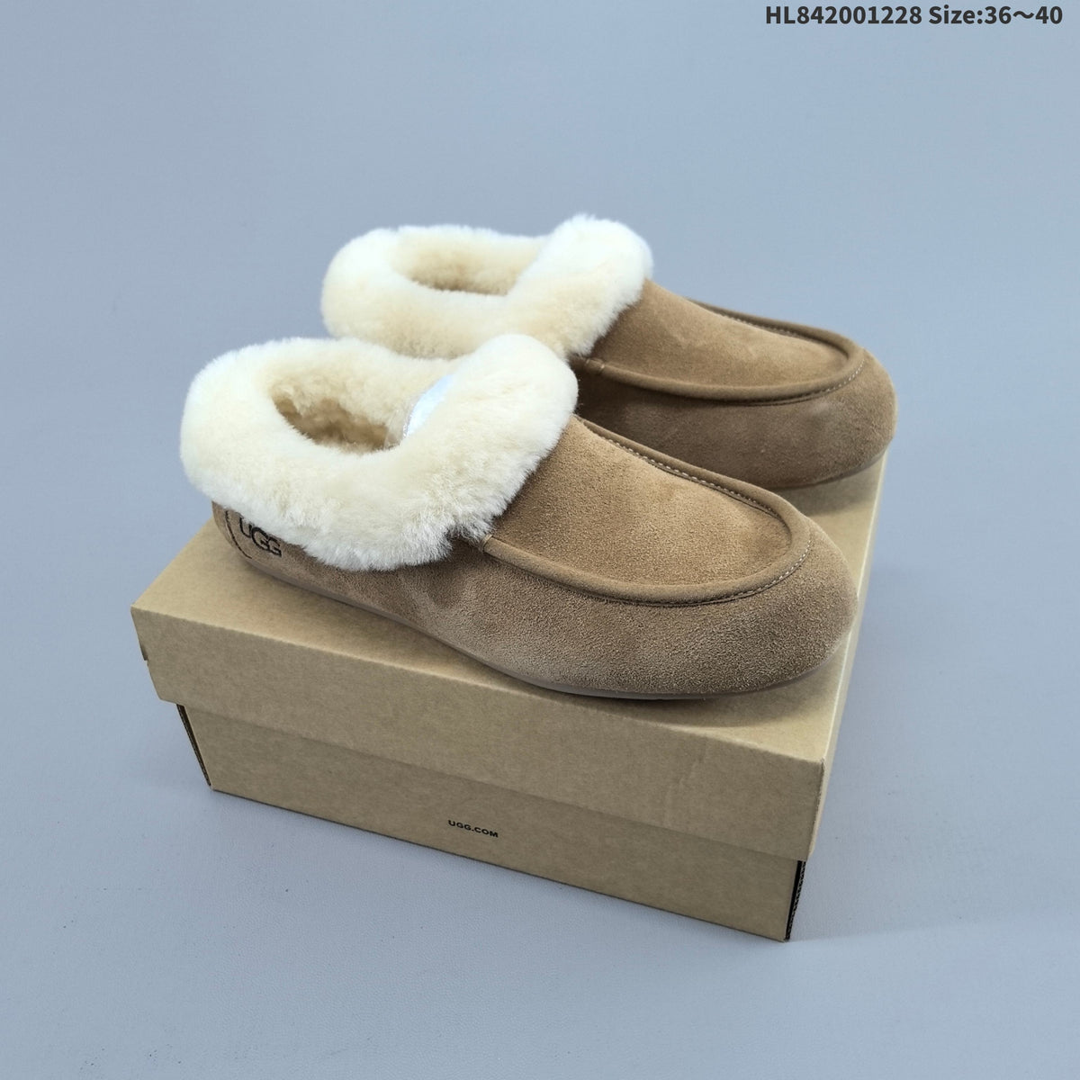 Classic Mini Dipper Suede Slippers with Faux-Fur Trim by UGG - product image from the listing.