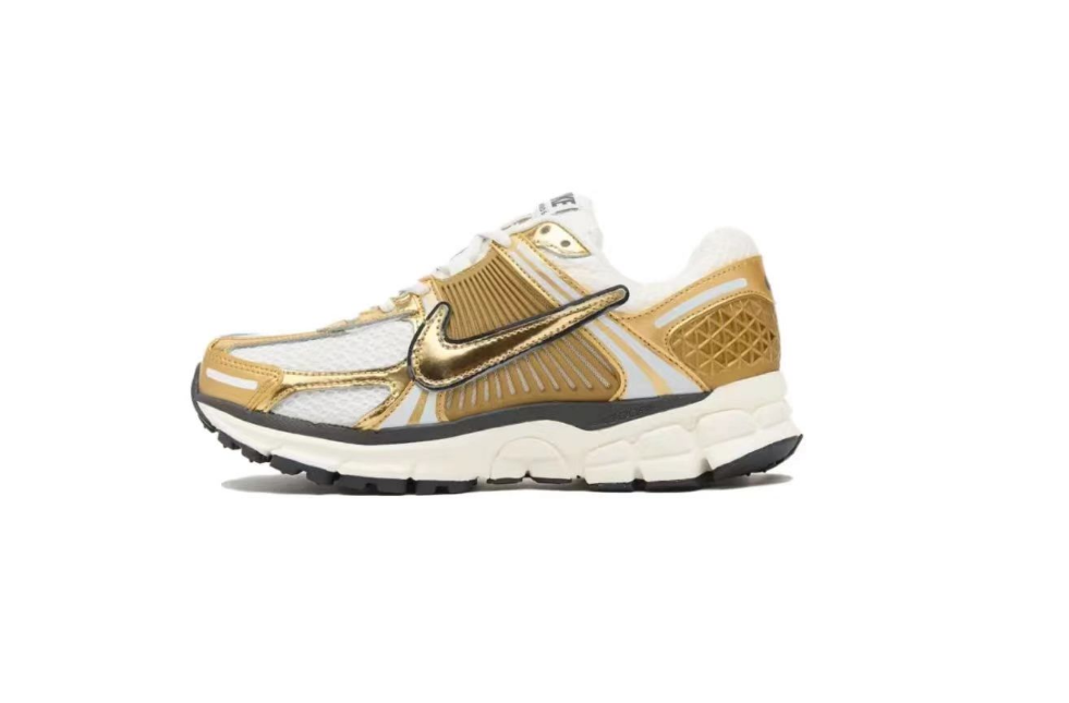 Nike Air Zoom Vomero 5 Running Shoes, in White and Gold - product image from the listing.
