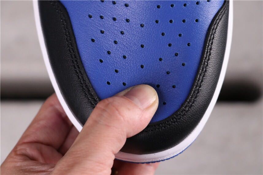 Air Jordan 1 Game Royal High-Top Sneakers in Black Blue White - product image from the listing.