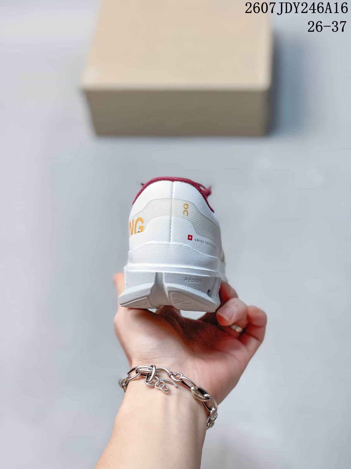 On Cloudstratus 3 Kids' Running Shoes in White Burgundy Yellow - product image from the listing.