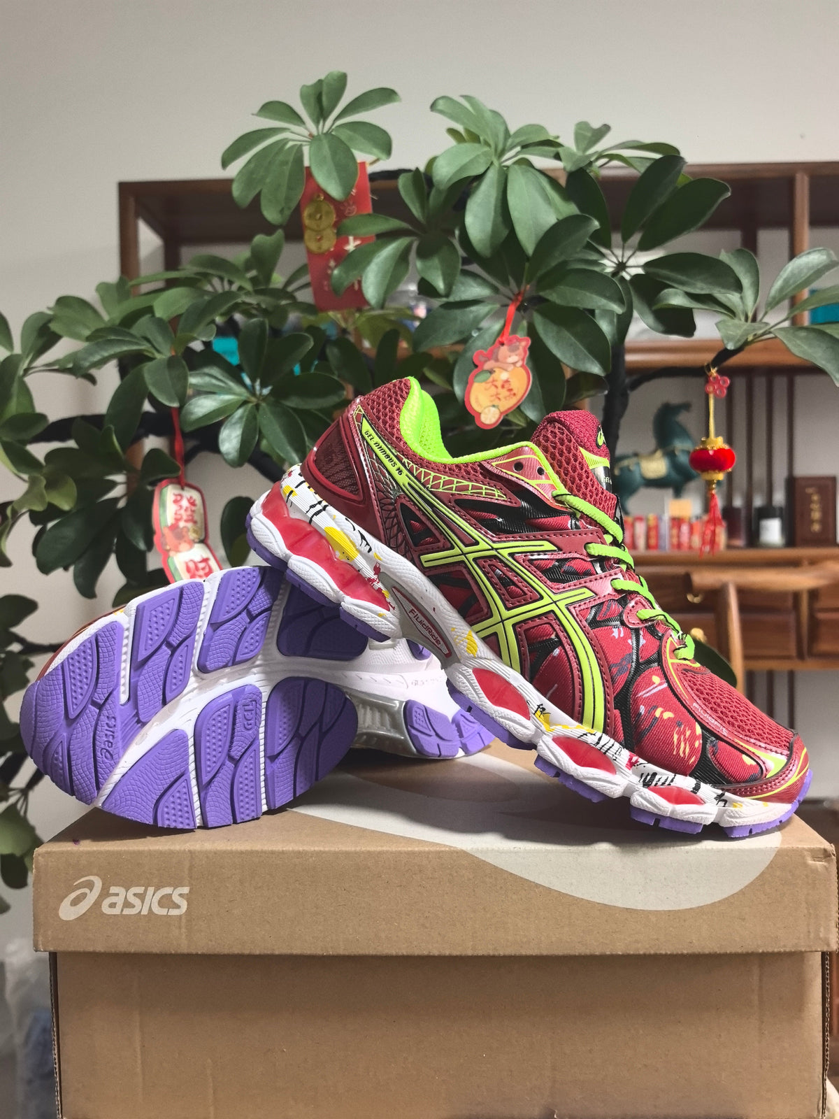 ASICS GEL-NIMBUS 16 Sneakers, in Burgundy and Lime - product image from the listing.