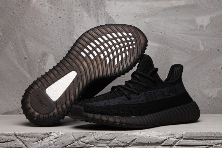 Yeezy Boost 350 V2 Sneakers in Black Knit - product image from the listing.