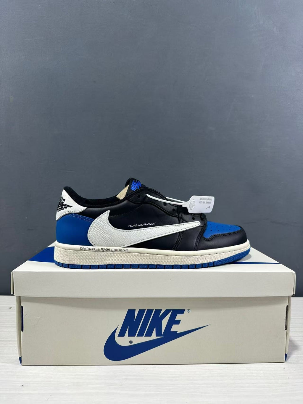Air Jordan 1 Low Travis Scott Fragment Black Blue Sneakers - product image from the listing.