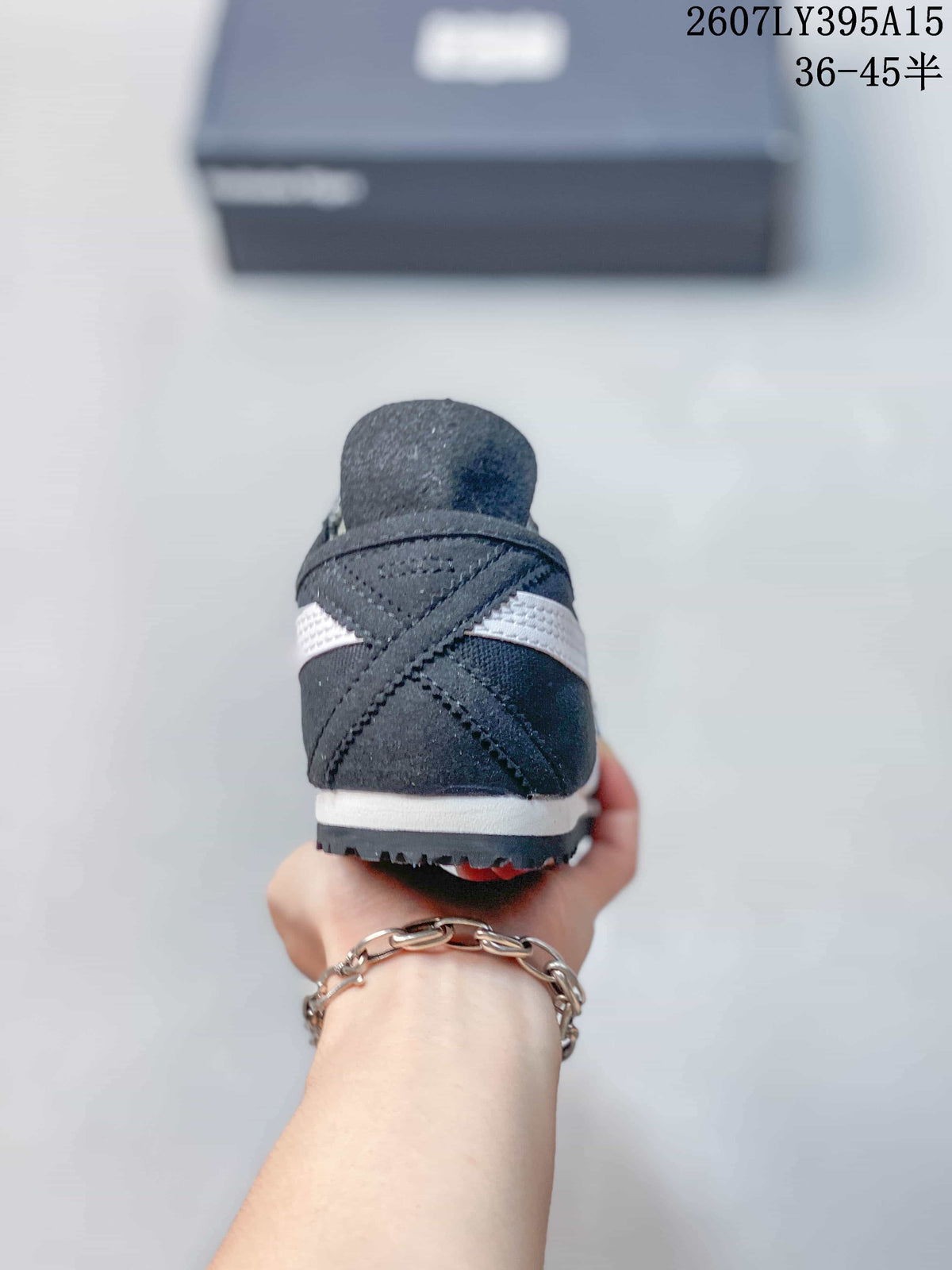 Onitsuka Tiger Mexico 66 Deluxe Sneakers in Black White 2607LY395A15 - product image from the listing.
