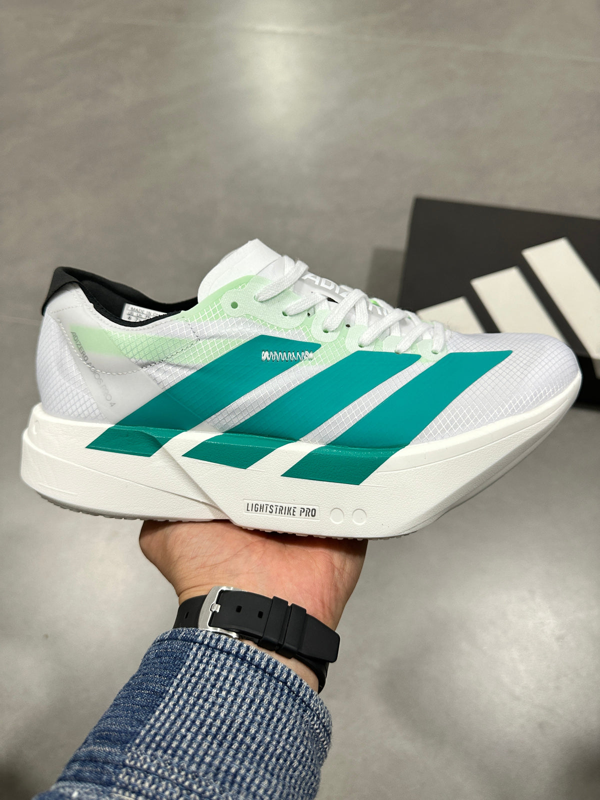Adidas Adizero Lightstrike Pro Running Shoes in White Teal - product image from the listing.
