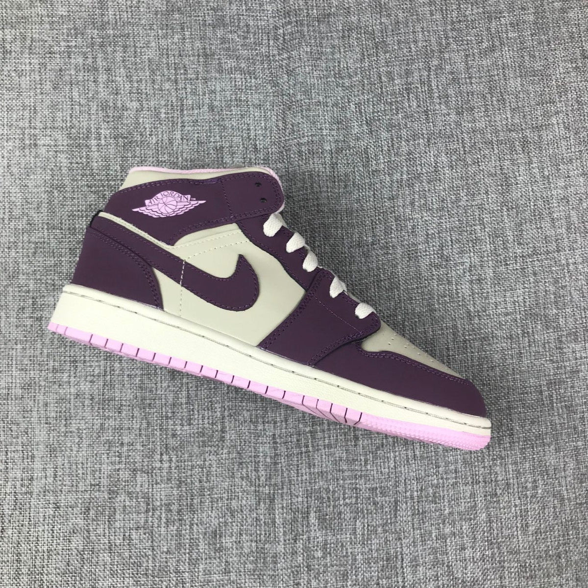 Air Jordan 1 Mid GS Sneakers in White Purple Pink - product image from the listing.