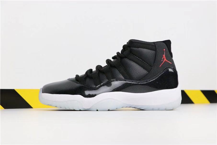 Air Jordan 11 Retro 72-10 High-Top Sneakers in Black and White - product image from the listing.