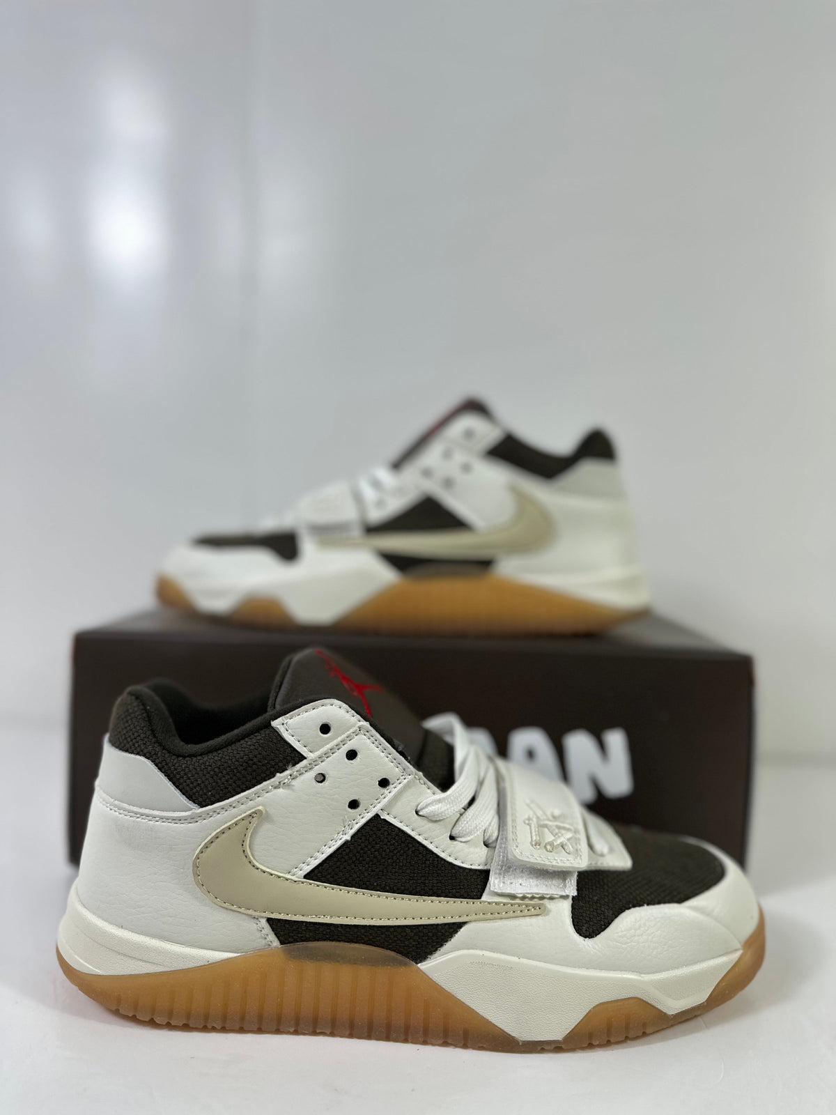 Jordan Jumpman Jack TR Low Sneakers in Sail Dark Mocha FZ8117-100 - product image from the listing.