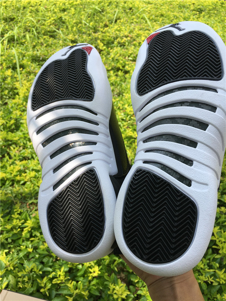 Air Jordan 12 Black Nylon High-Top Sneakers - product image from the listing.