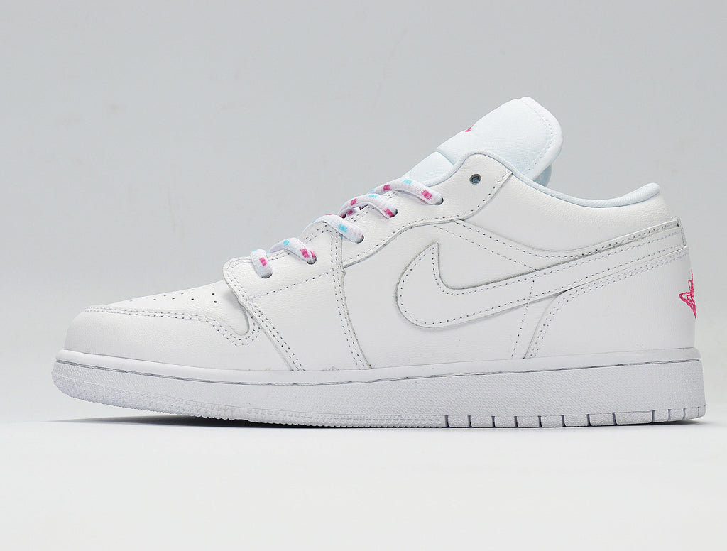 Air Jordan 1 Low White and Pink Sneakers - product image from the listing.