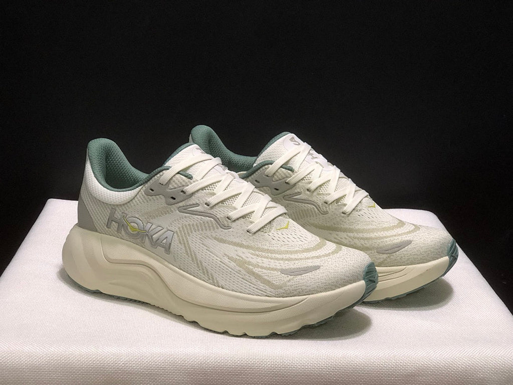 HOKA Arahi 8 Shoes for Running in Cream and Sage - product image from the listing.