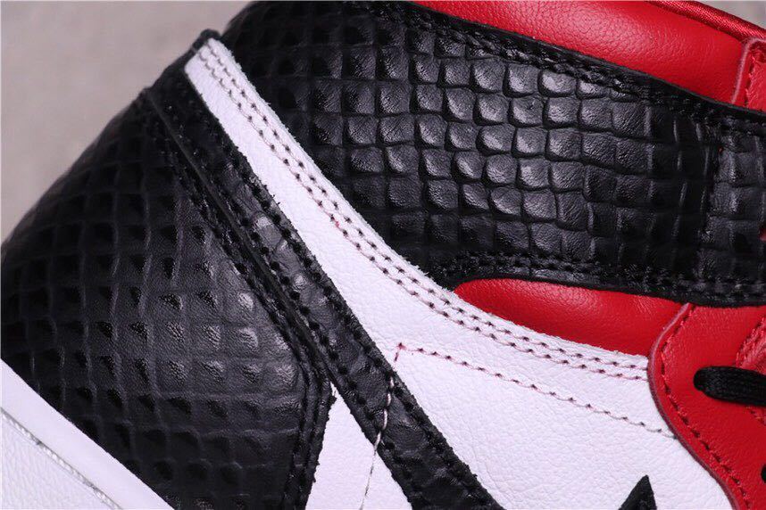 Women's Air Jordan 1 Satin Snake High-Top Sneakers CD0461-601 - product image from the listing.