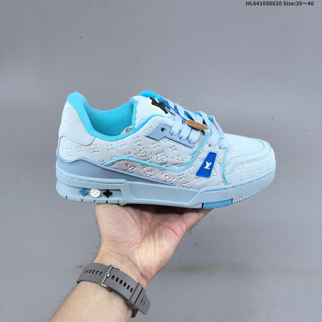 Louis Vuitton Trainer Low-Top Sneakers, in White and Green/Blue - product image from the listing.