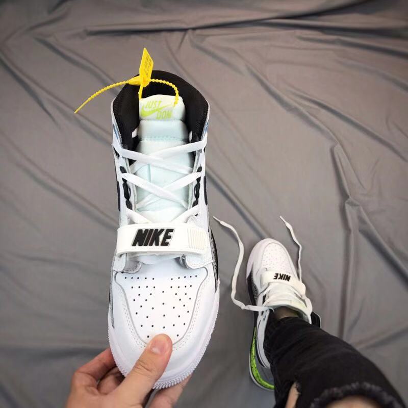 Air Jordan Legacy 312 High-Top Sneakers White Black Volt - product image from the listing.