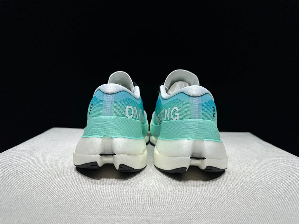 On Cloudboom Max Running Shoes, in White and Light Blue - product image from the listing.