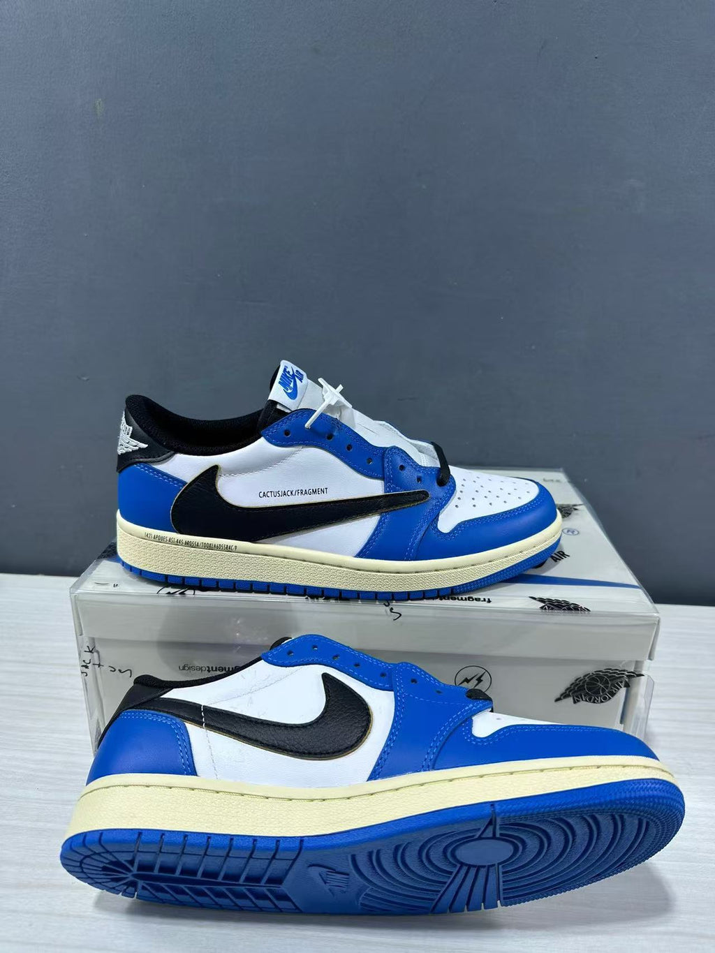 Jordan 1 Low Travis Scott Fragment in Blue White DM7866-141 - product image from the listing.