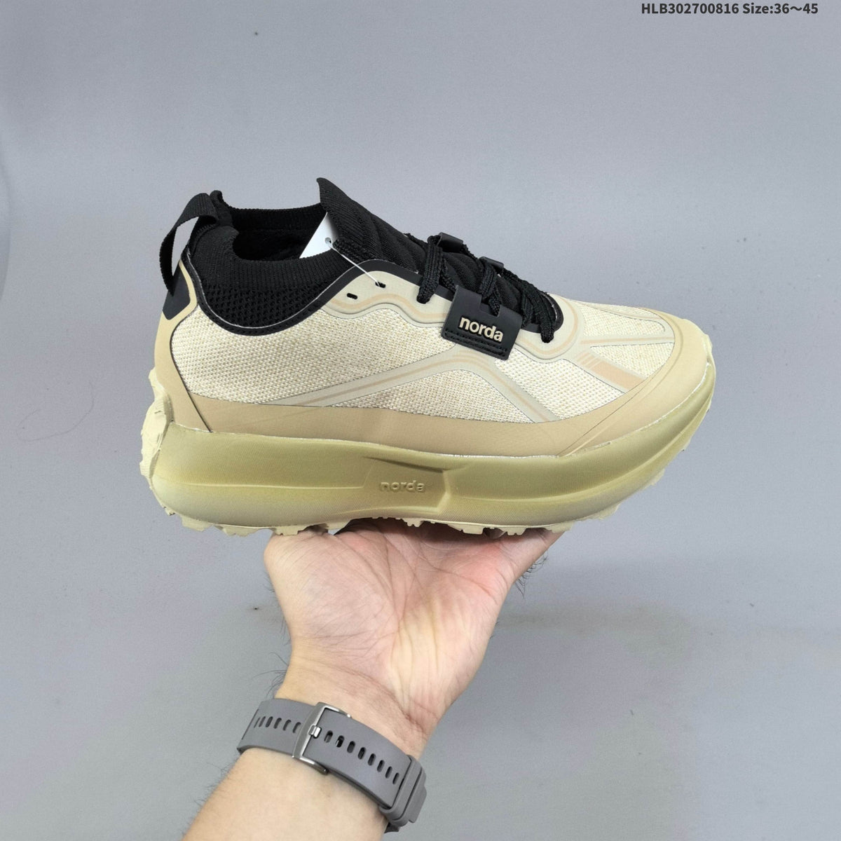 Cream and Black Norda 055 Trail Running Shoes - product image from the listing.